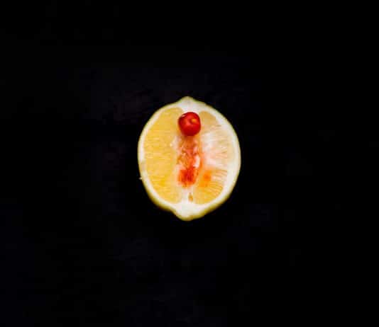 sliced fruit on black surface